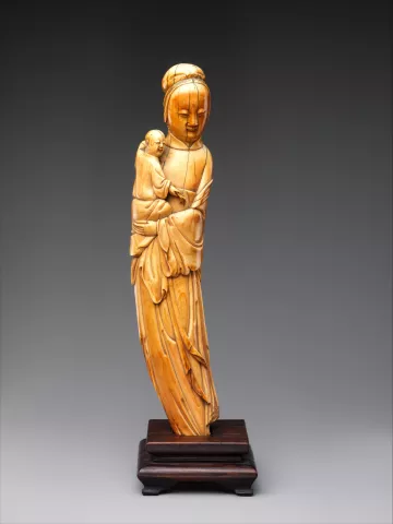 Guanyin 16th century holding infant statue