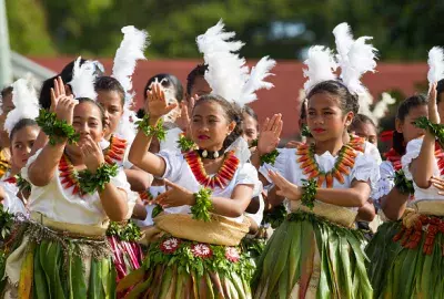 Young female traditional dancers in Tonga performing