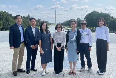 Members of the 2022 Korea-US Journalist Exchange pose in front of the Washington Monument.