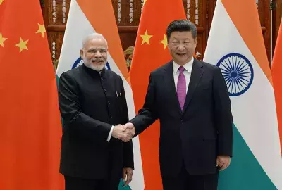  Indian Prime Minister Narendra Modi ( L) shakes hands with Chinese President Xi Jinping (R) at the West Lake State Guest House on September 4, 2016 in Hangzhou, China.