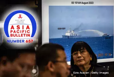 Footage of a Chinese Coast Guard ship using a water cannon against a Filipino resupply vessel is shown during a press conference at the Department of Foreign Affairs 
