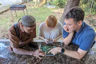 EWC researchers and local community members during a field excursion in Southeast Asia