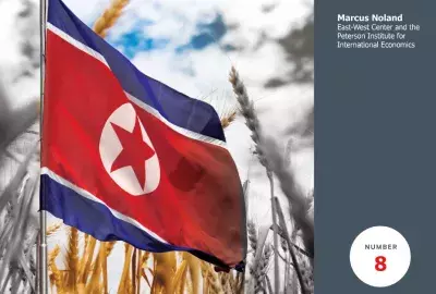 The North Korean flag flies over a wheat field with the text "Marcus Noland" and the number 8
