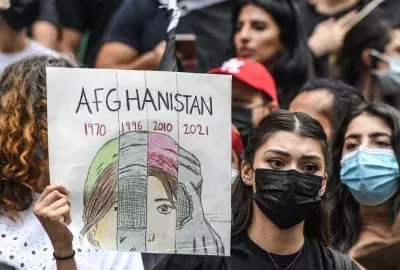 Woman protests for Afghan women in New York City (Photo: Stephanie Keith/Getty Images)