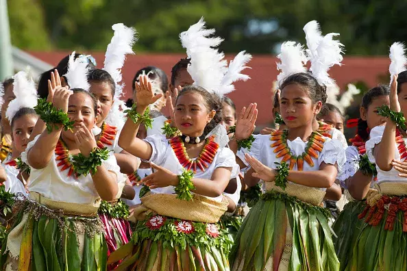 Young female traditional dancers in Tonga performing