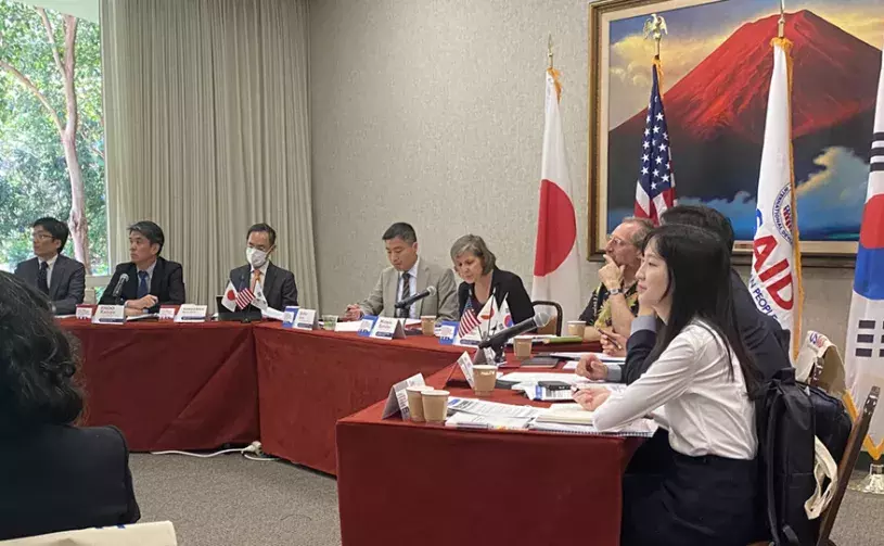 Officials from Japan, South Korea, and the US meeting at EWC for the USAID trilateral development dialogue