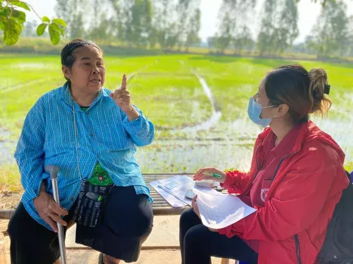 Interviewing farmer in Thailand
