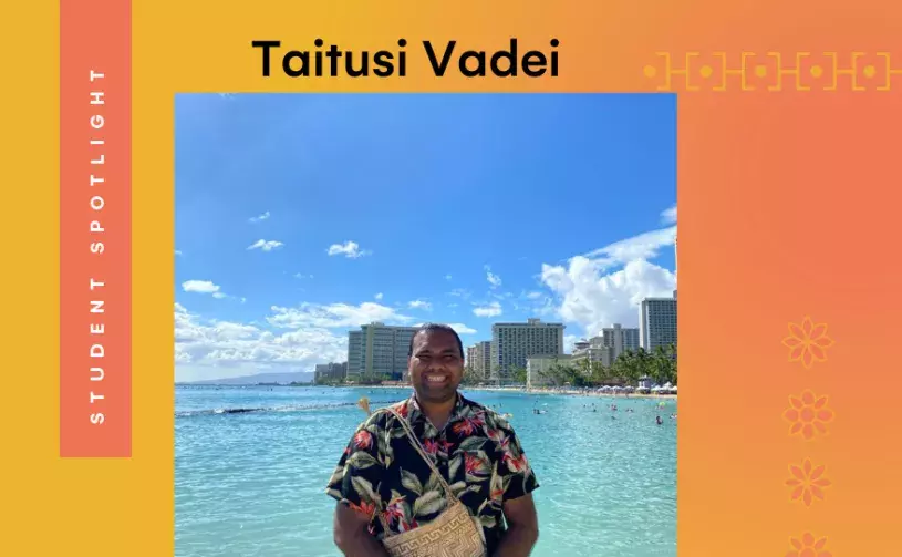 Taitusi Vadei standing in front of Waikiki beach
