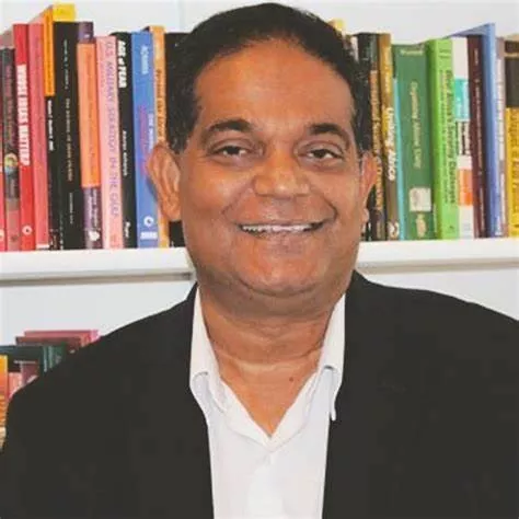 Amichav Acharya in a suit